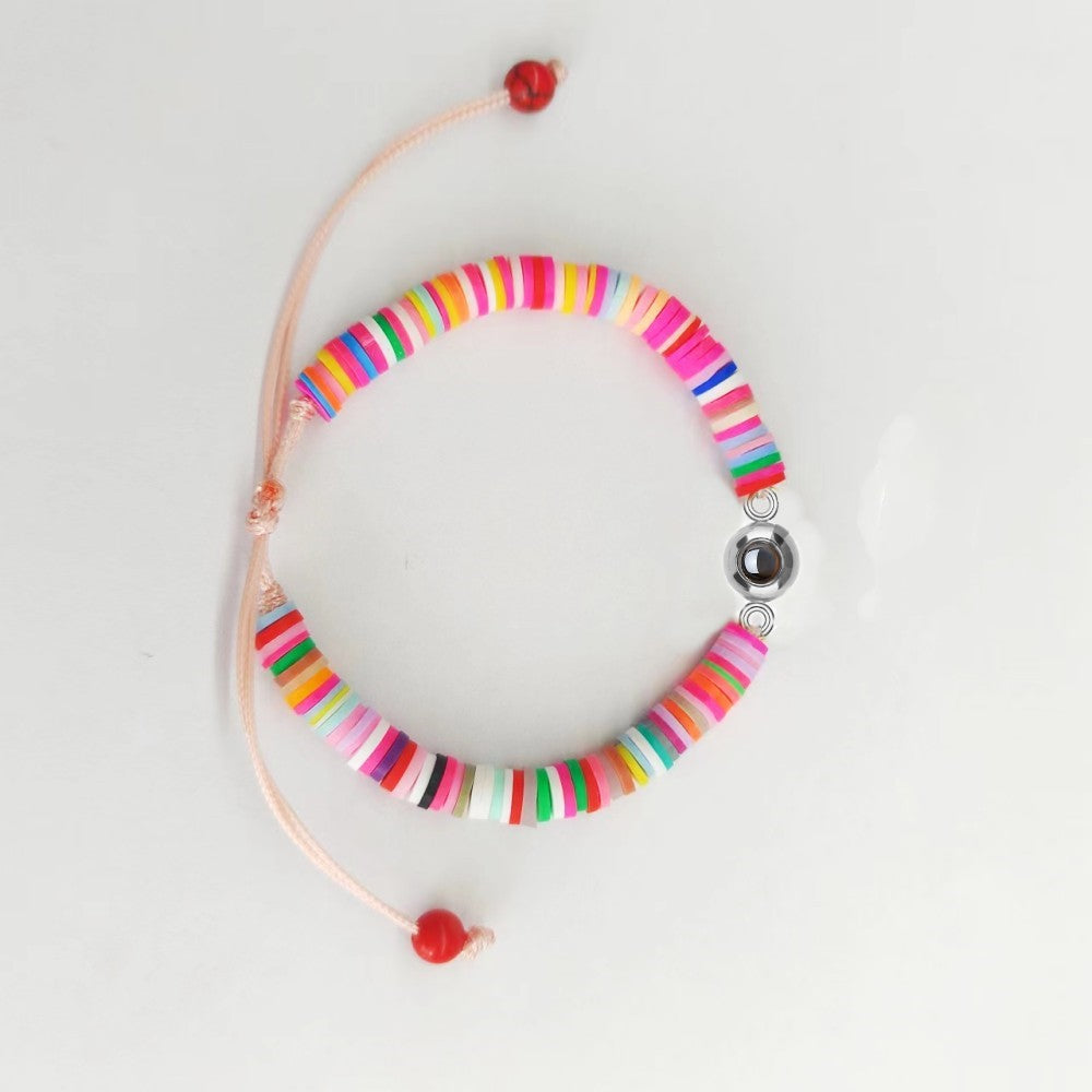 Projektionsarmband mit Anhänger – handgefertigt aus farbigem Polymer