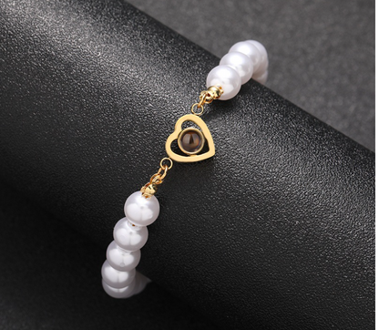 Weißes Luxus Perlen Herz Foto Armband