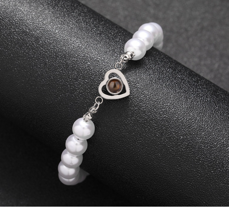 Weißes Luxus Perlen Herz Foto Armband