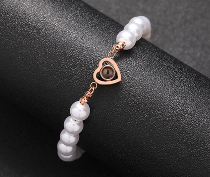 Weißes Luxus Perlen Herz Foto Armband